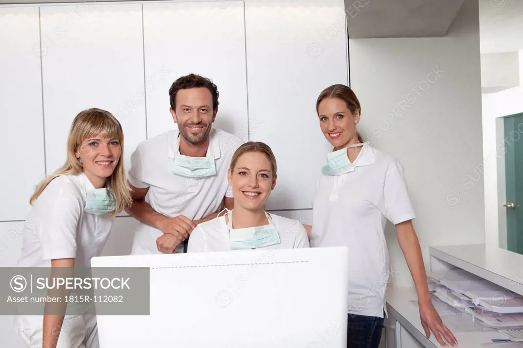Germany, Dentist and assistance smiling, portrait