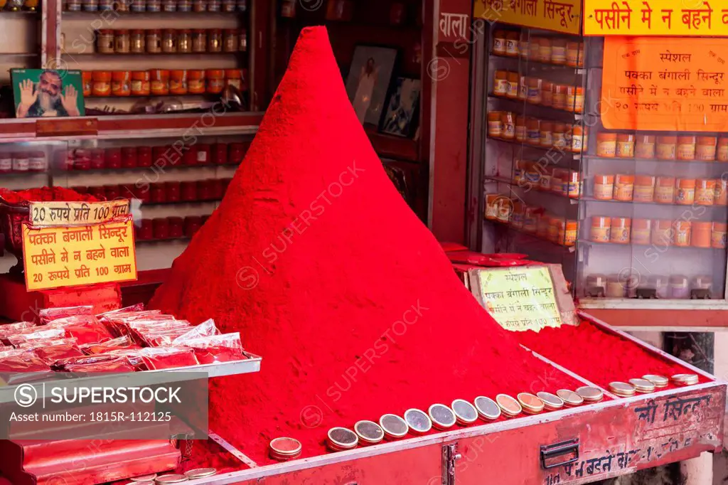 India, Uttarakhand, Haridwar, Red tika powder at market stall