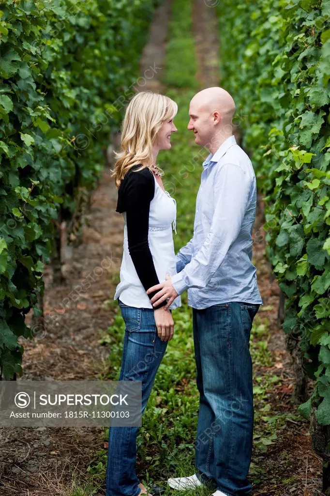 Young couple standing face to face