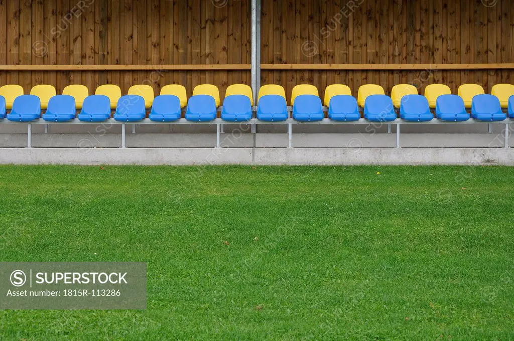 Germany, Bavaria, Munich, Stand with blue and yellow plastic seats