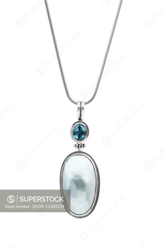 Silver pendant with blue mabe pearl and blue topaz