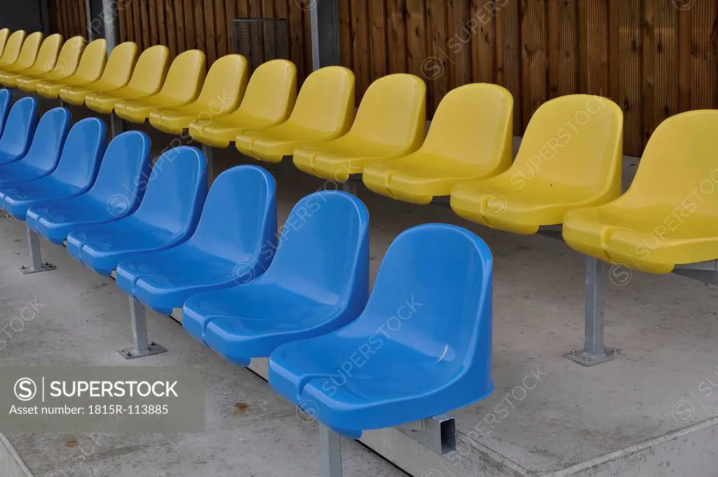 Germany, Bavaria, Munich, Stand with blue and yellow plastic seats