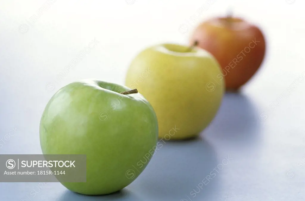 Apples in a line, close up