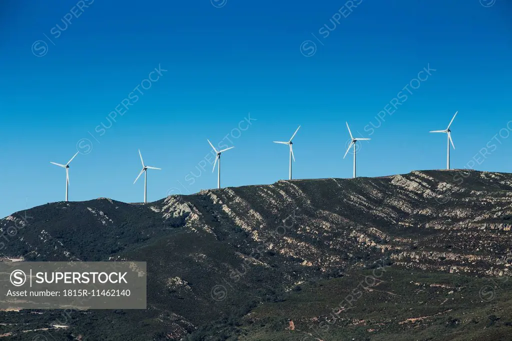 Spain, Andalusia, Tarifa, wind turbines on mountain