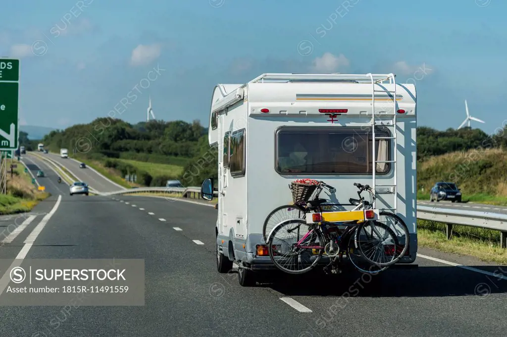 UK, Cornwall, Tintagel, Caravan with bike rack on country road