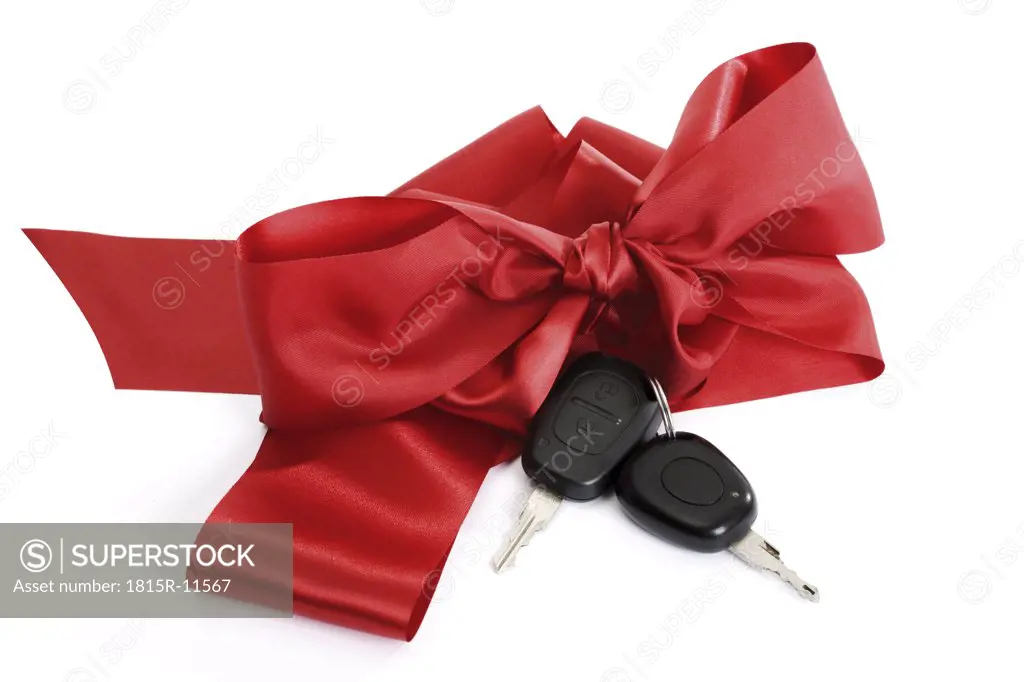 Car keys with red bow, close-up