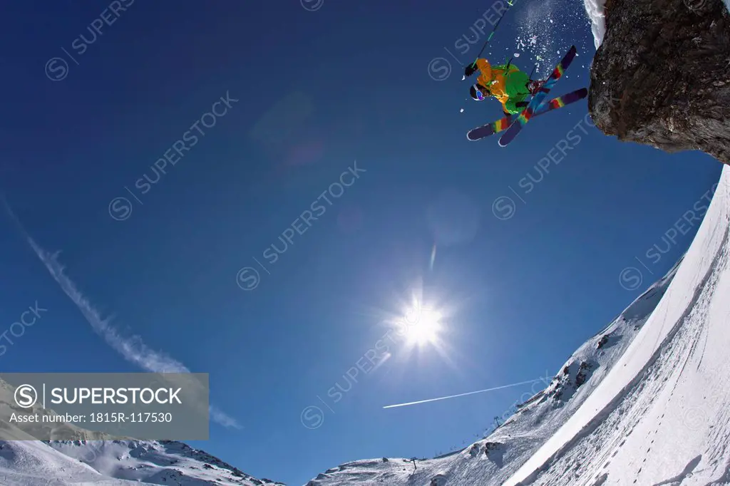Austria, North Tirol, Mature man ski jumping