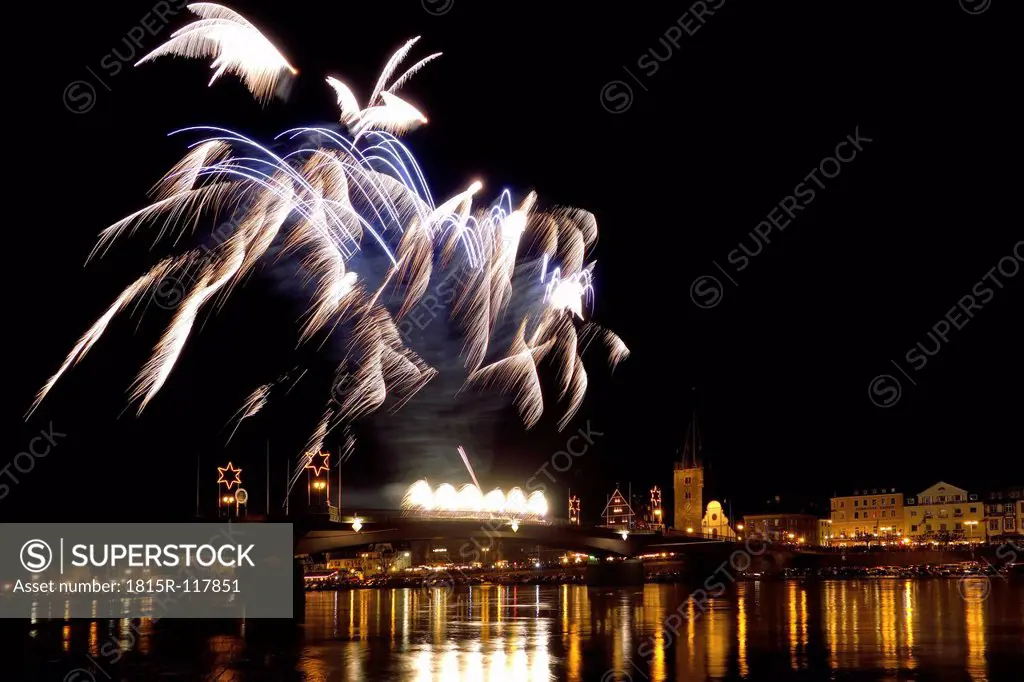 Germany, Fireworks exploding on bridge at River Mosel