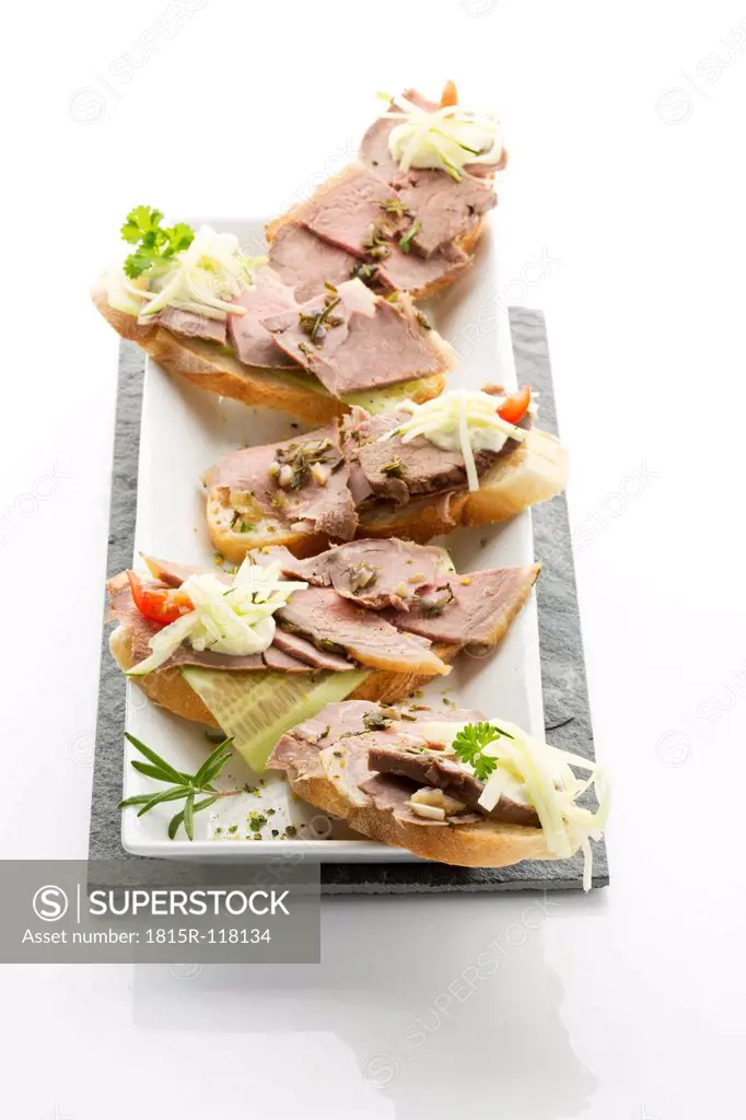 Cold roast beef sandwiches on tray