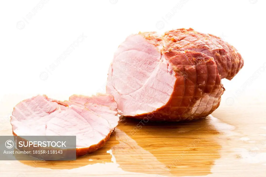 Smoked pork chop on chopping board, close up