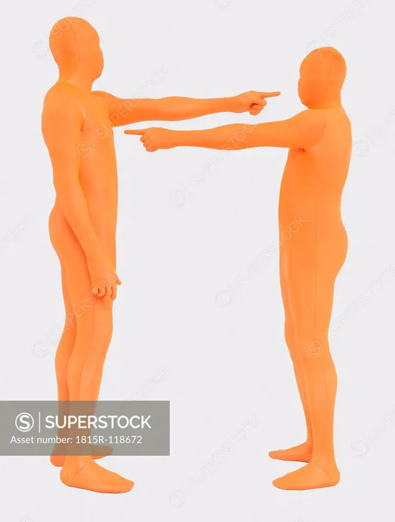 Men pointing to each other against white background