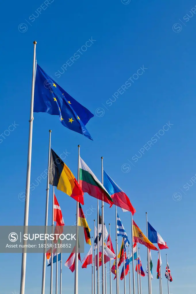 Luxembourg, European flags against sky