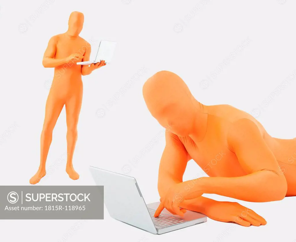 Men in orange zentai using laptop