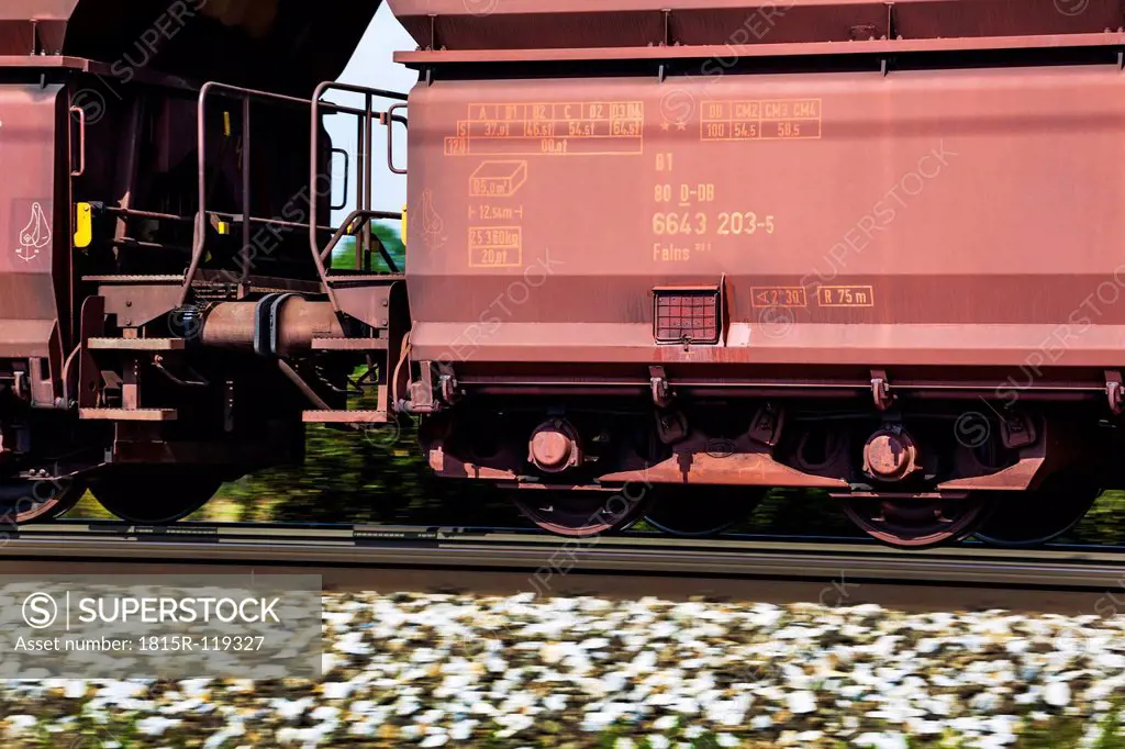Austria, Freight train wagons on rails, close up