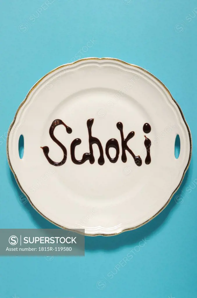 Text form with chocolate sauce on plate