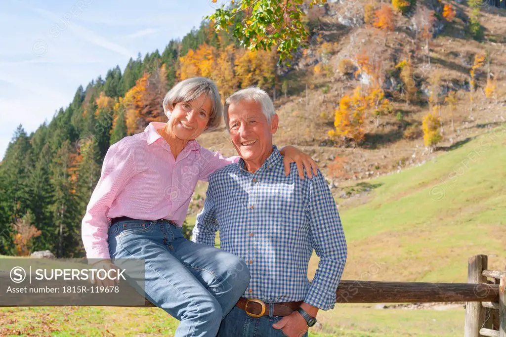 Germany, Bavaria, Senior couple on mountain hike near Wendelstein