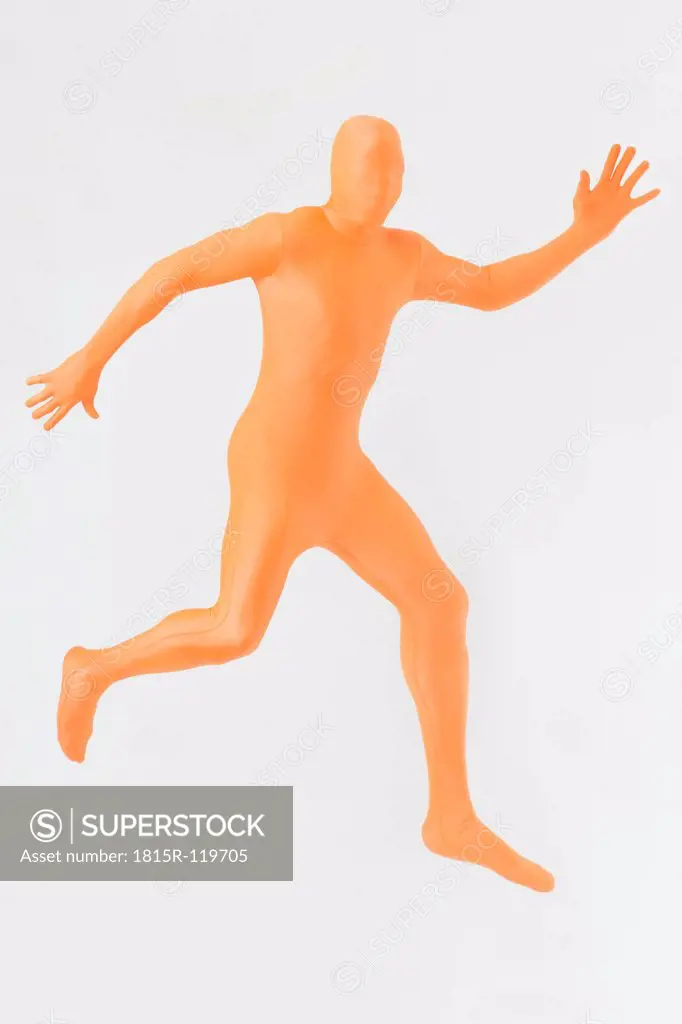 Mature man in orange zentai running on white background