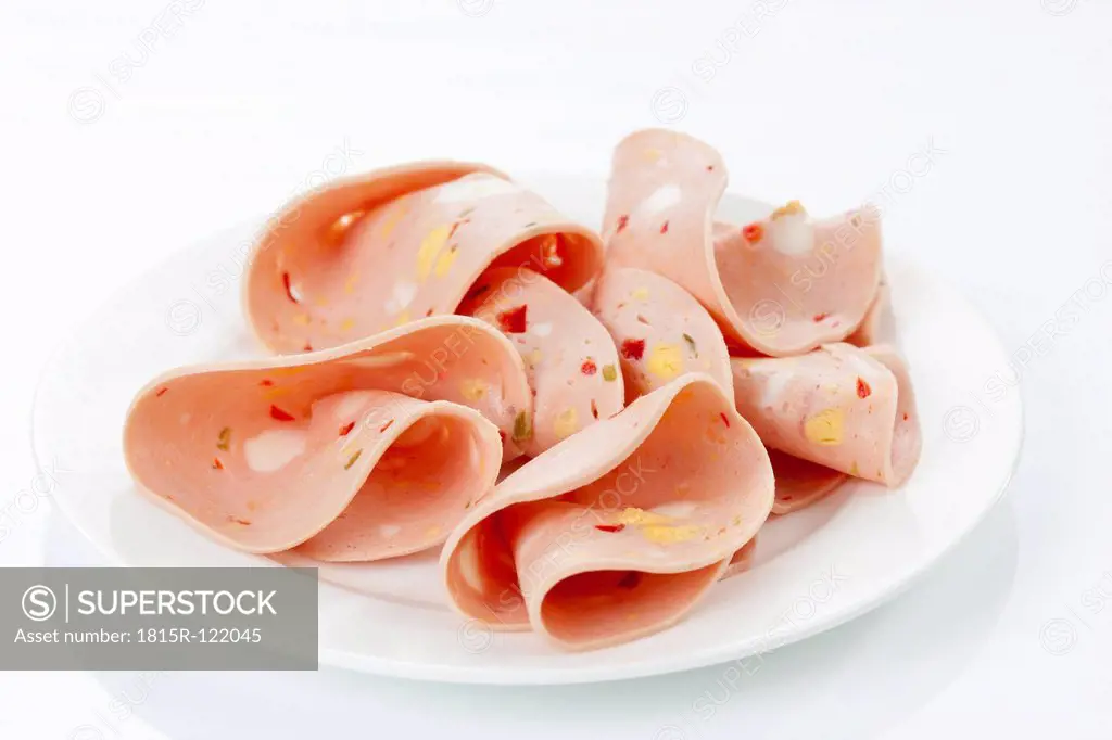 Plate of mortadella sausage with egg and paprika, close up