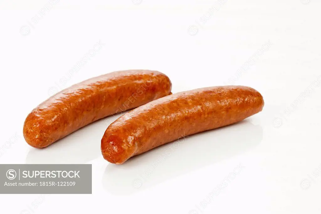 Ground pork sausage on white background, close up