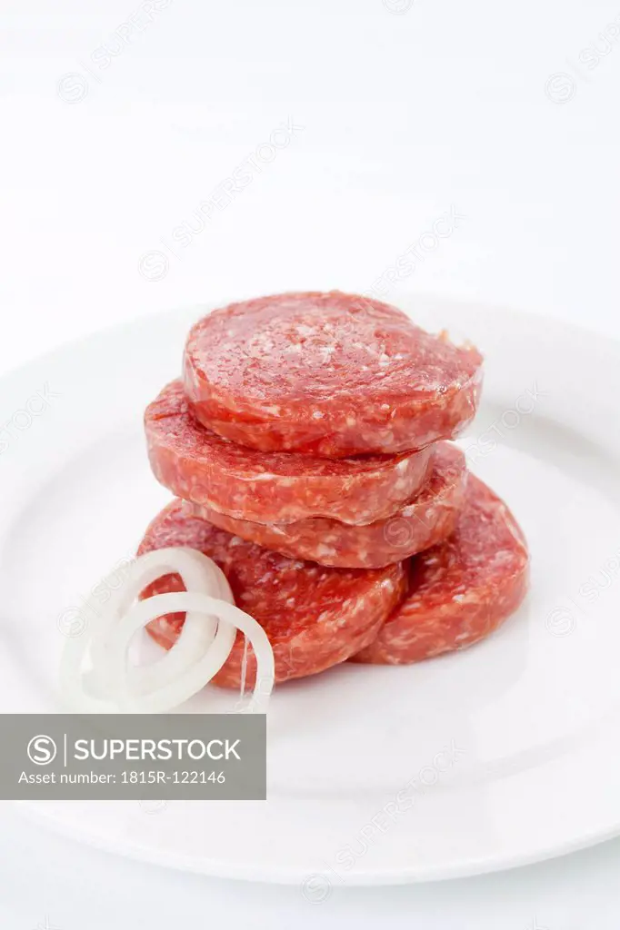 Plate of onion pork sausage, close up