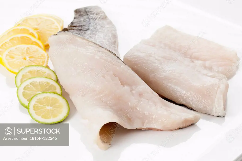 Fresh pike perch fillet on white background, close up