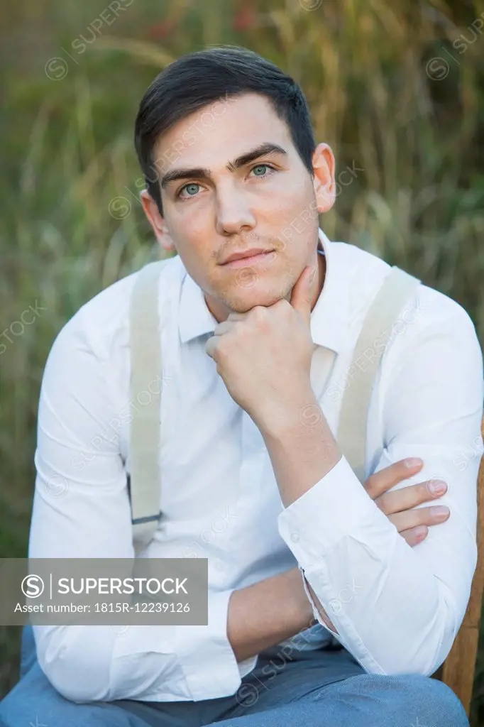Portrait of young man outdoors