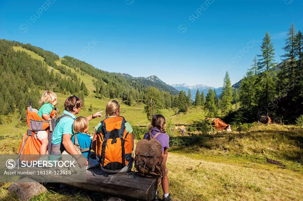 Austria, Salzburg, Family watching mountains at Altenmarkt Zauchensee