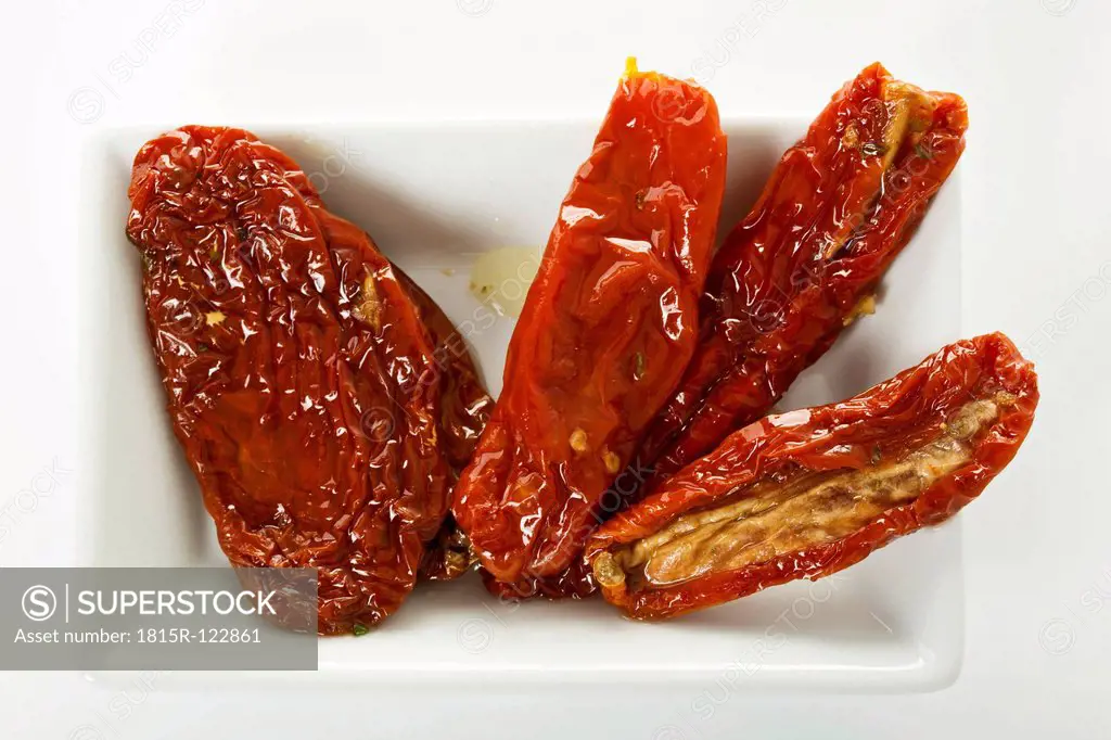 Plate of dried tomatoes, close up
