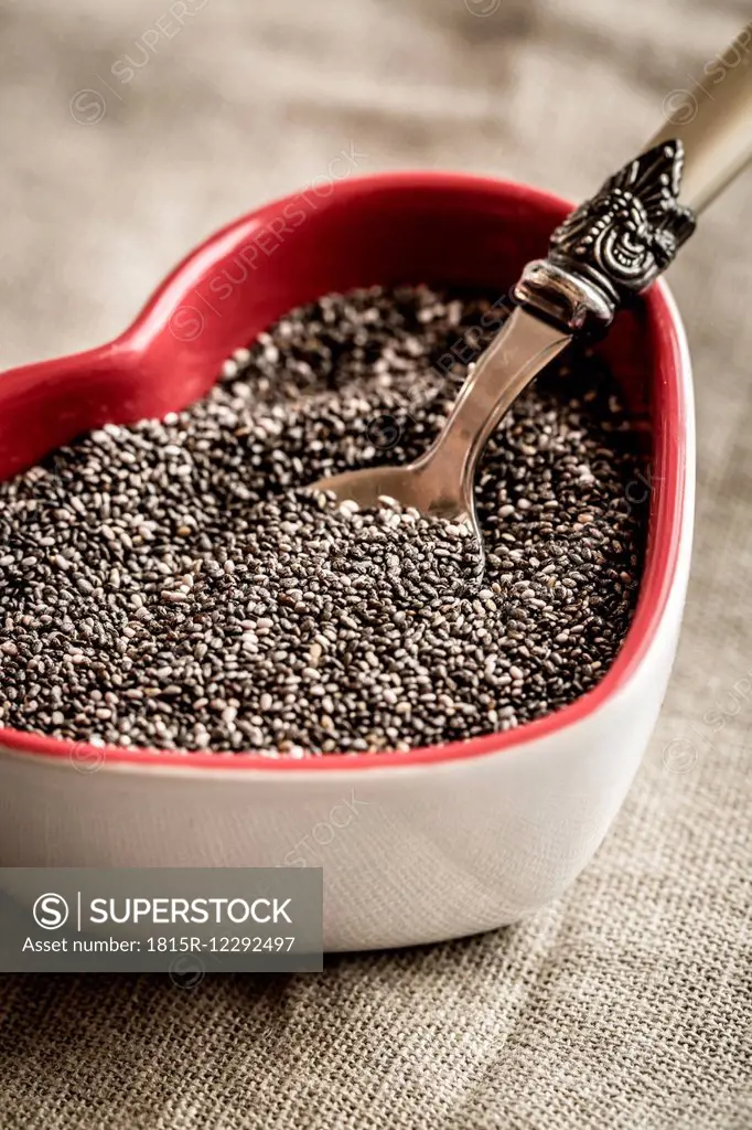 Heart-shaped bowl of chia seeds