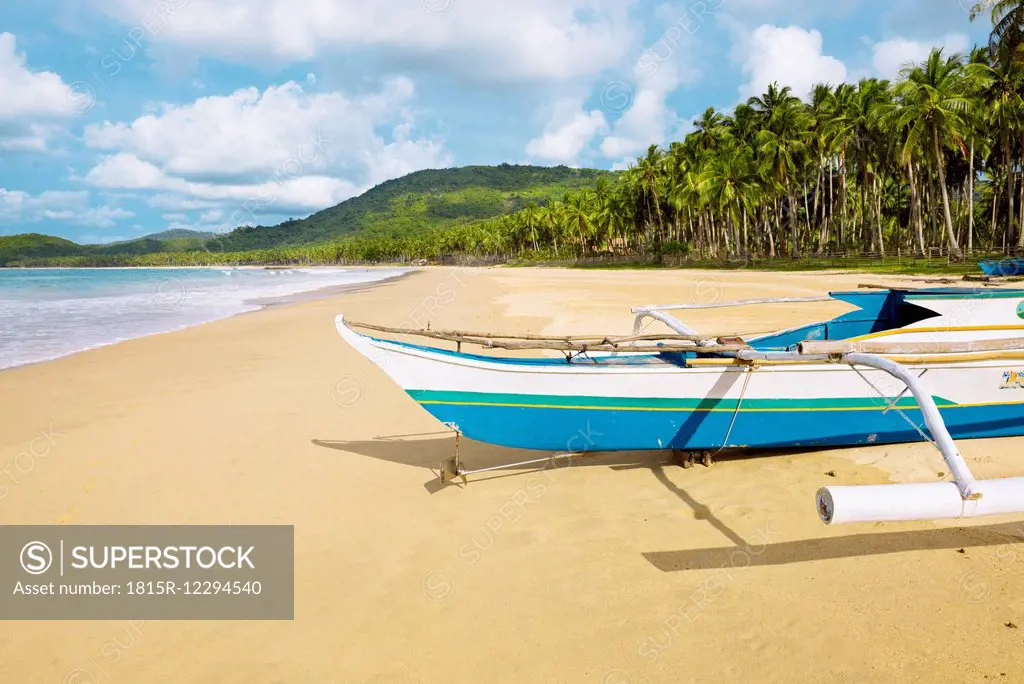 Philippines, Palawan island, Traditional fishing boat at Nacpan beach