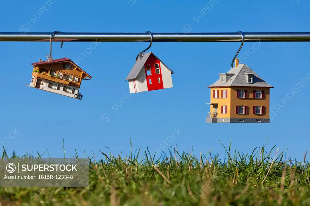 Germany, Baden Wuerttemberg, Stuttgart, House model hanging on steel rod
