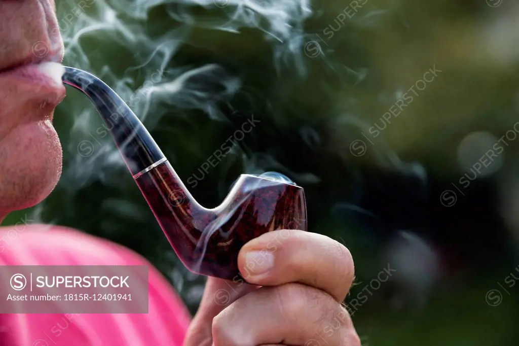 Man smoking pipe
