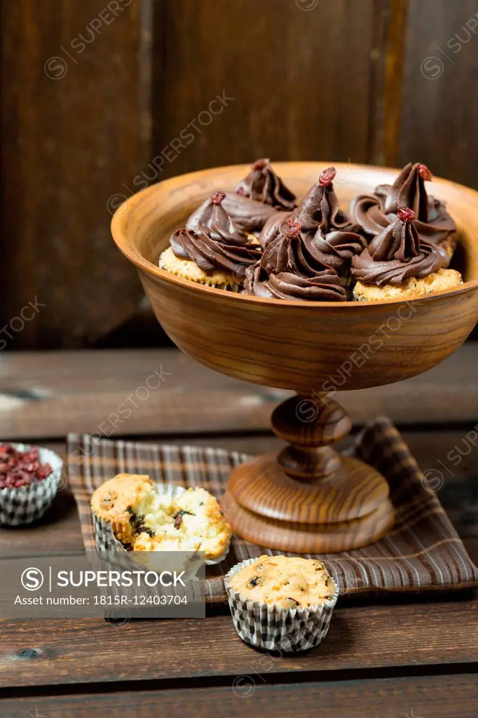 Mini cupcakes with chocolate ganache and barberries