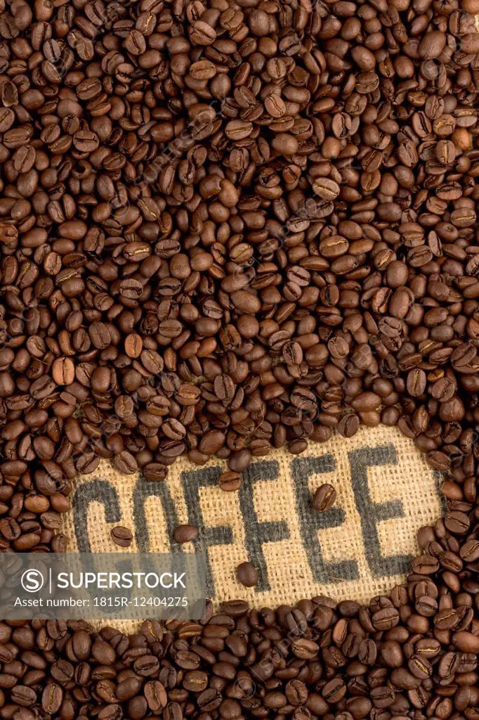 Coffee beans and word 'Coffee' on jute