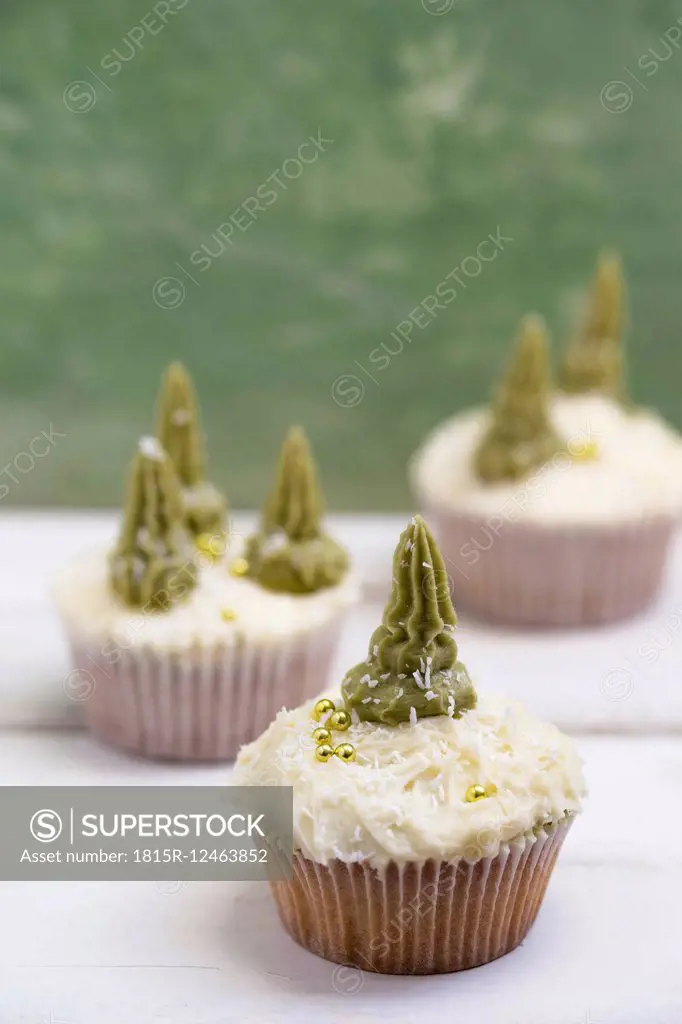 Homemade Christmas cupcakes with fir trees