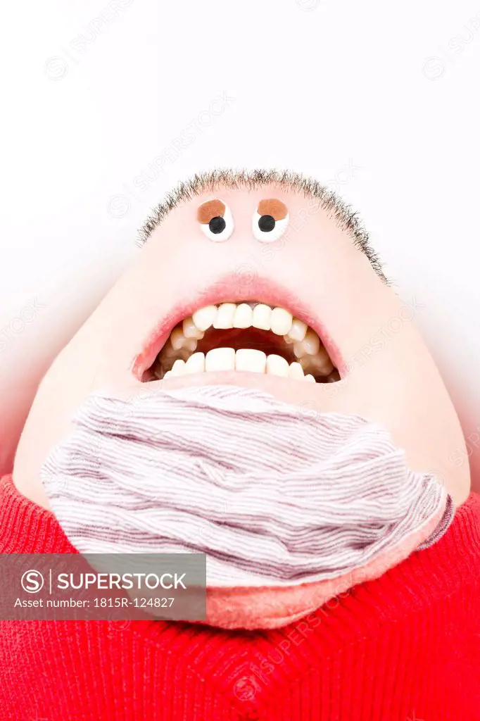 Man created with face on chin against white background