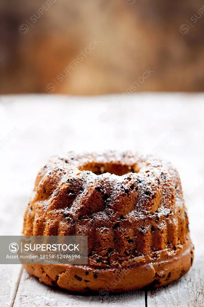 Chocolate cake sprinkled with icing sugar