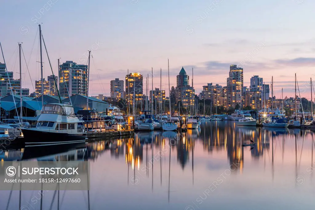 Canada, British Columbia, Vancouver, skyline at dusk as seen from Stanley Park