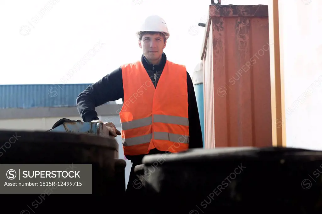 Portrait of construction worker with safety helmet and safety jacket