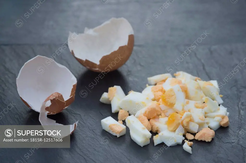 Hard-boiled egg, eggshell on slate