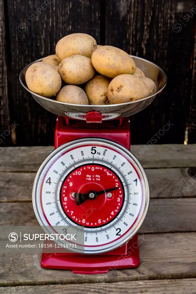 Kilogram of potatoes on a kitchen scale