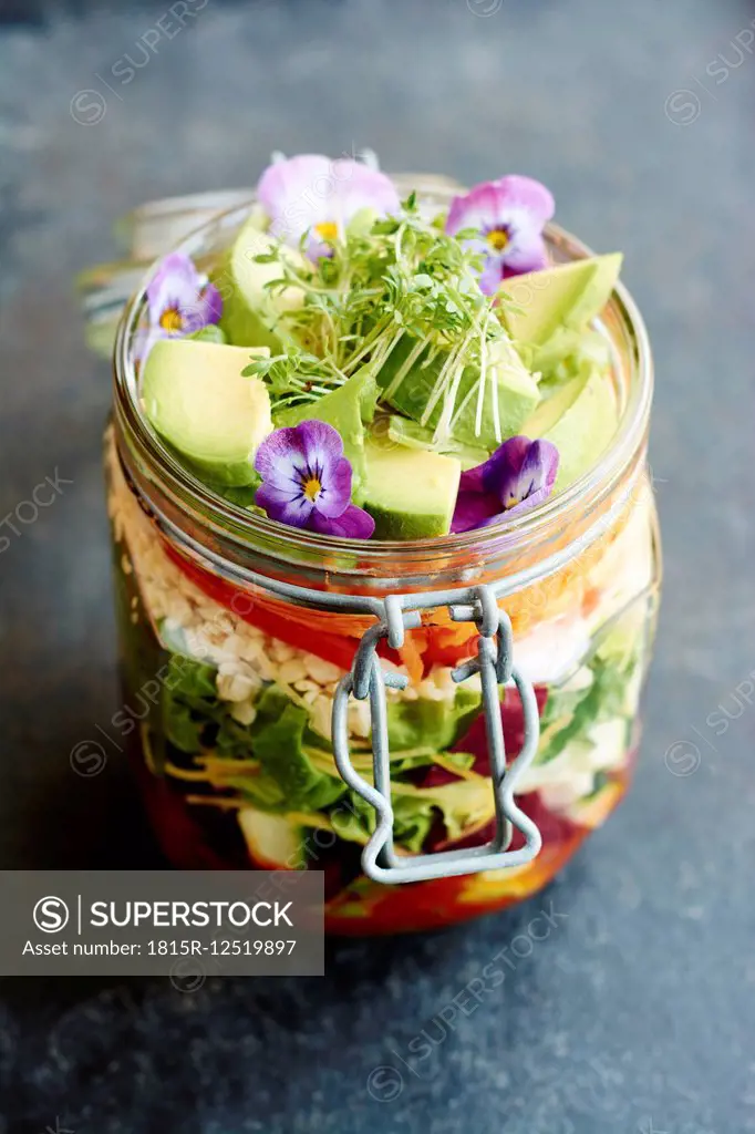 Mixed healthy salad in jar