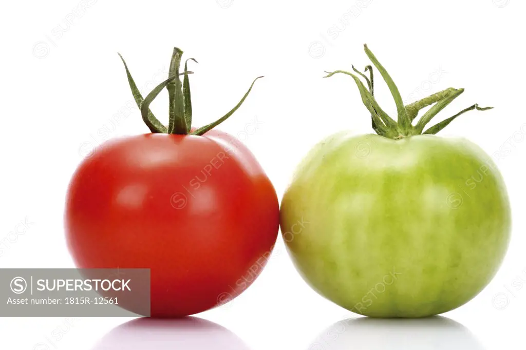 Red and green tomato, close-up