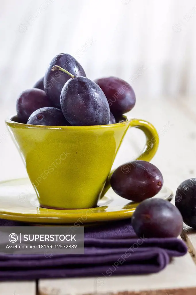 Plums in a cup