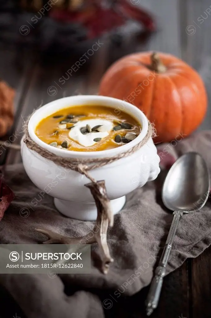 Bowl of Hokkaido-Soup with sour cream and pumpkin seed
