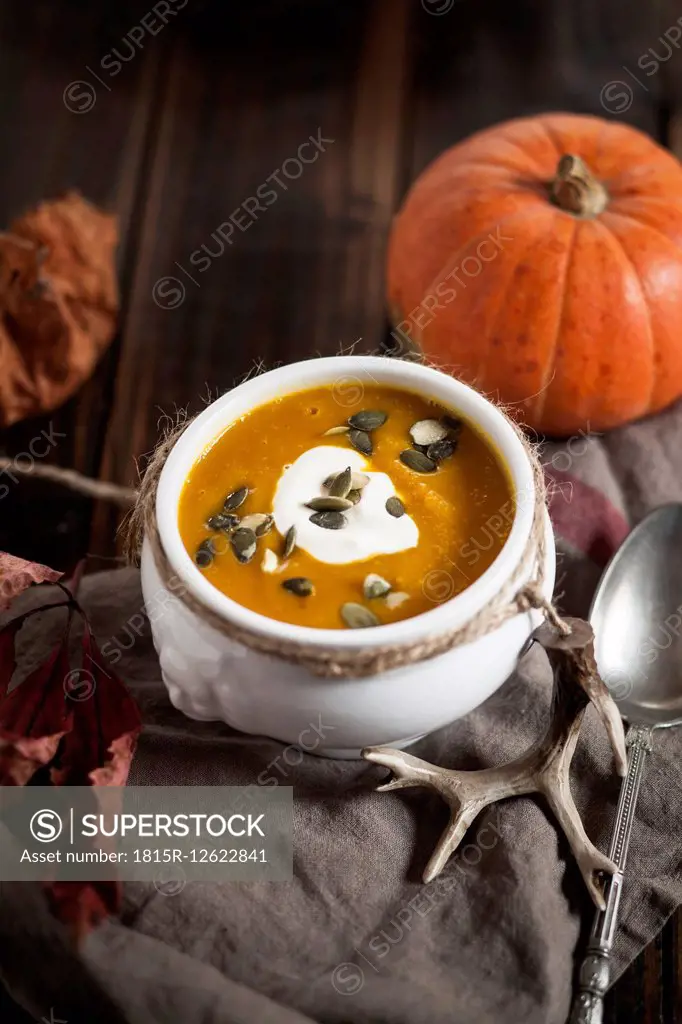 Bowl of Hokkaido-Soup with sour cream and pumpkin seed
