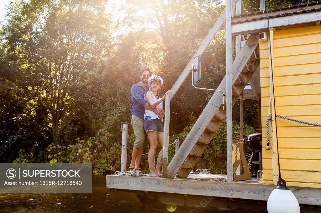 Couple embracing on a house boat