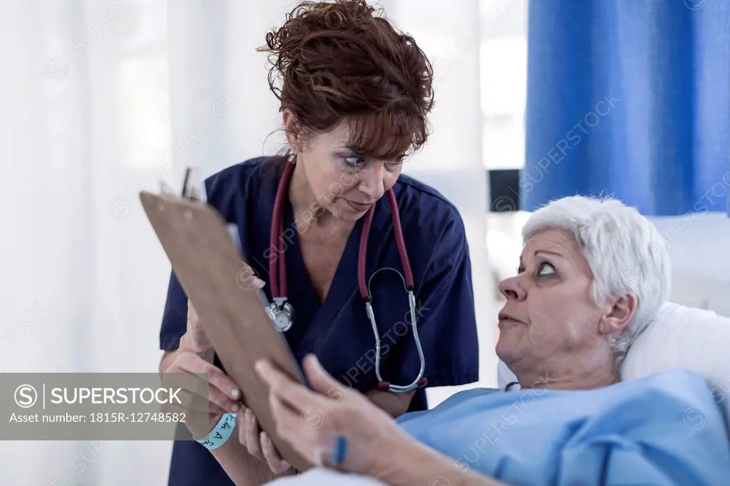 Doctor explaining patient advance directive