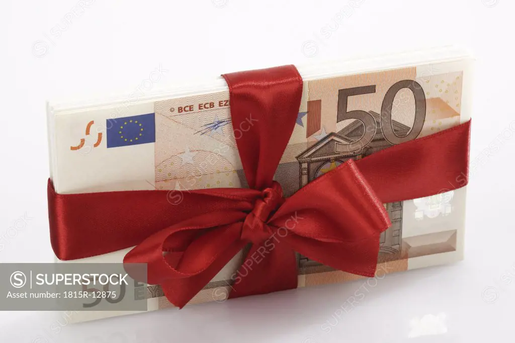Bunch of banknotes tied as gift