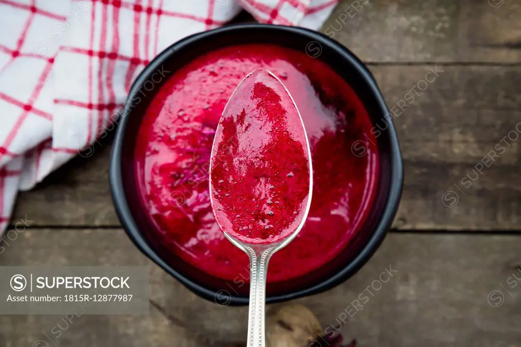 Spoon and bowl of beetroot soup